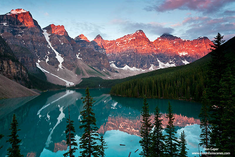 Image of Wenkchemna Peaks reflected in Moraine Lake, sunrise