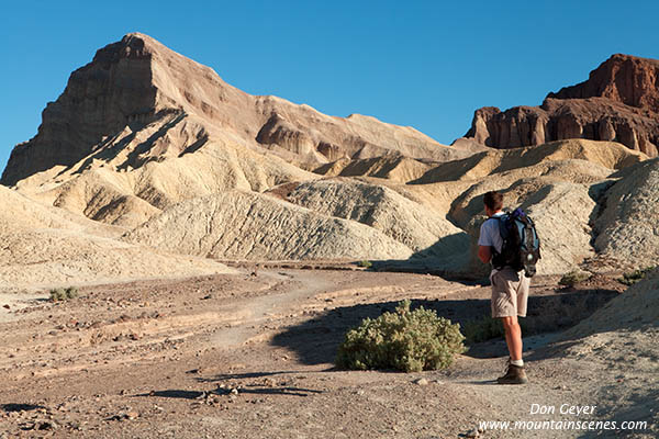 Image of hiker on Golden Canyon trail, Manly Beacon, Death Valley