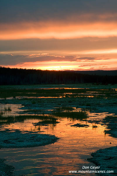 Image of sunset reflected in Hot Lake, Yellowstone National Park.