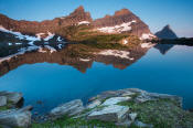 Image of Cathedral Peak reflected in Sue Lake in Glacier.