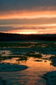 Image of Sunset reflected in Hot Lake, Yellowstone National Park.