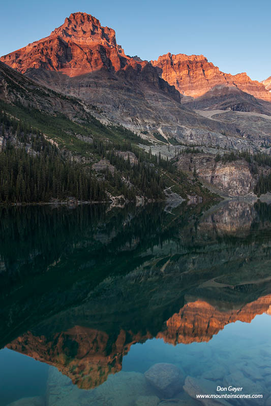 Image of Mount Huber reflected in Lake O'Hara, evening