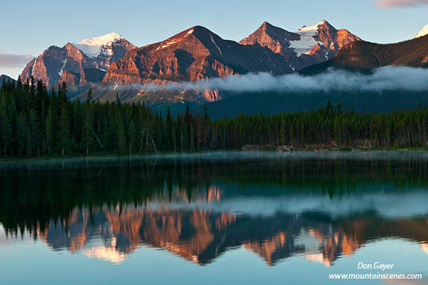 Image of Mount Temple, Mount Victoria reflected in Herbert Lake