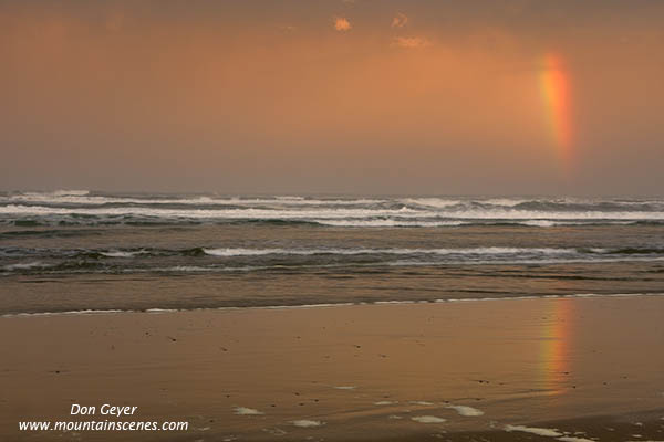 Image of Rainbow at Sunrise above Tillicum Beach