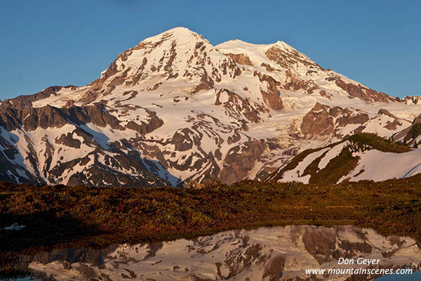 Image of Mount Rainier above a tarn in Sunset Park