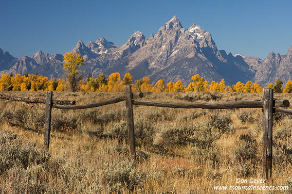 Image of Grand Teton above fence and sagebrush, autumn, fall, Grand Teton National Park