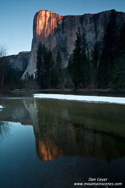 Image of El Capitan reflected in Merced River, sunrise.