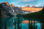 Image of Wenkchemna Peaks reflected in Moraine Lake, sunrise