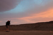 Image of Photographer composing sunset image, Death Valley