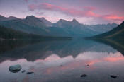 Image of sunset reflected in Lake Elizabeth in Glacier.