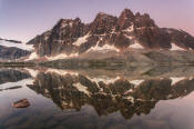 Image of The Ramparts reflected in Amethyst Lake, Tonquin Valley