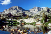 Image of Fremont Peak reflected in tarn in Wind Rivers